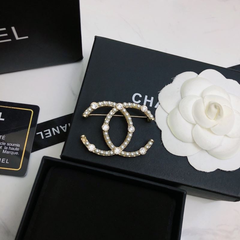 Ch*el brooches